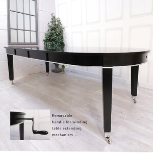 Large Oval Extending Dining Table with Silver Detailing and Castors Ex-Display