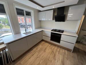 True Handleless Ex-Display Kitchen with Corian Worktop and Caple Appliances